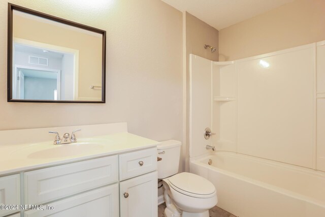 full bathroom featuring vanity, toilet, and shower / tub combination