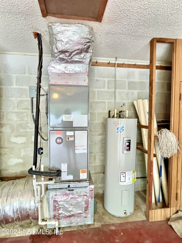 utility room with electric water heater