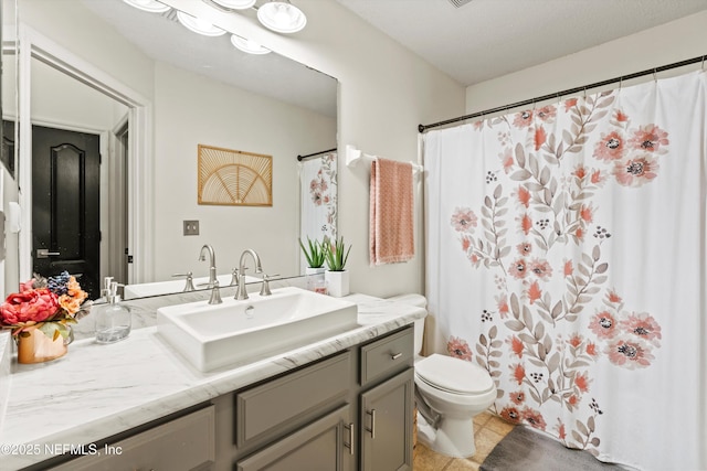 9042 Ford Rd, Bryceville, FL 32009 - bathroom featuring toilet, tile patterned floors, vanity, and curtained shower