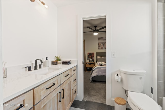 9042 Ford Rd, Bryceville, FL 32009 - full bathroom featuring ensuite bath, toilet, vanity, and a ceiling fan