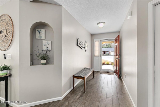 entryway featuring a textured ceiling