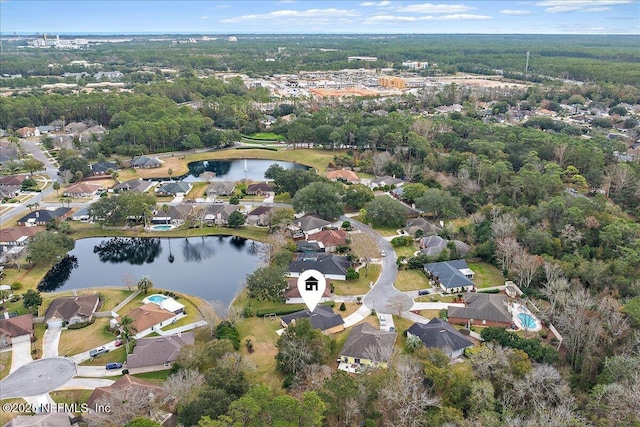 drone / aerial view with a water view