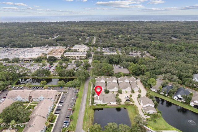 bird's eye view with a residential view and a water view