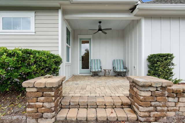 view of patio featuring ceiling fan