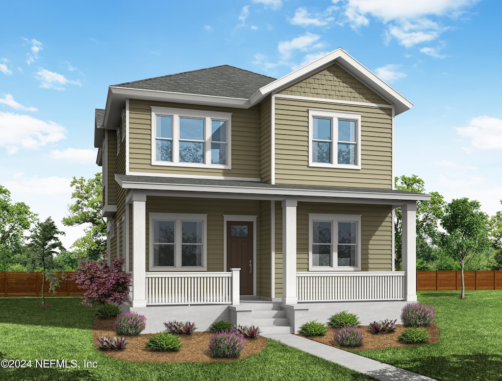 view of front of house featuring covered porch and a front yard