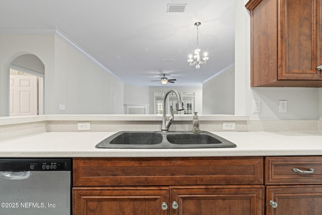 kitchen with light countertops, crown molding, visible vents, stainless steel dishwasher, and a sink