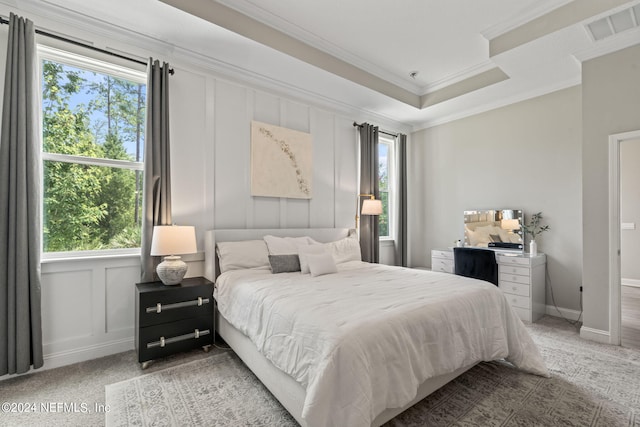 bedroom featuring carpet, multiple windows, and crown molding