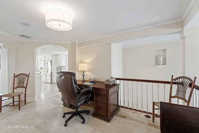 home office with crown molding and a textured ceiling