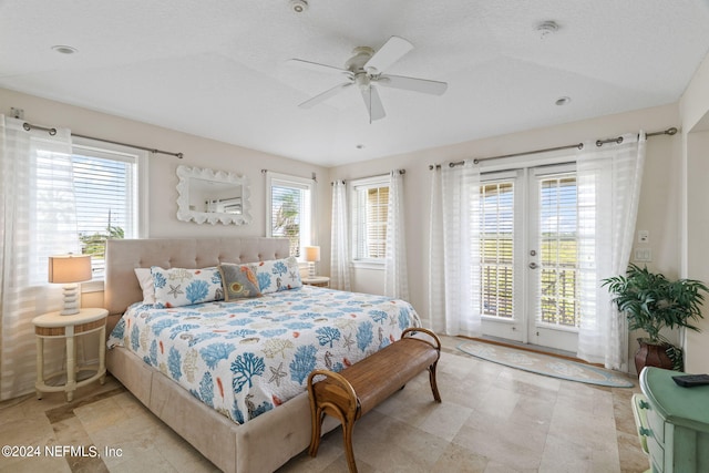 bedroom with french doors, ceiling fan, and access to outside