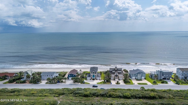 bird's eye view with a water view and a residential view