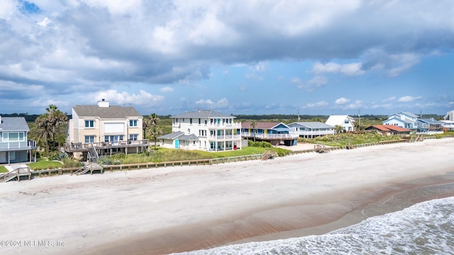 aerial view with a residential view and a water view