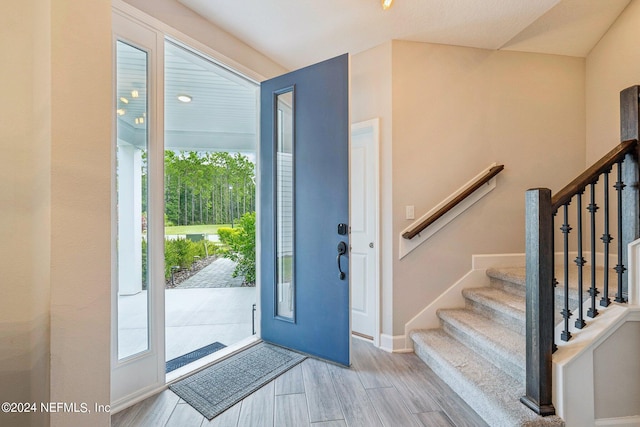 foyer with light wood-type flooring