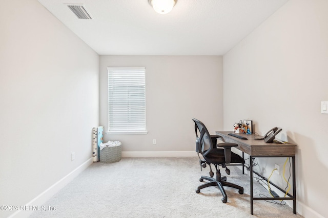 office space featuring light colored carpet