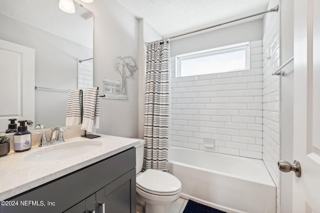 full bathroom with a textured ceiling, vanity, toilet, and shower / bath combination with curtain