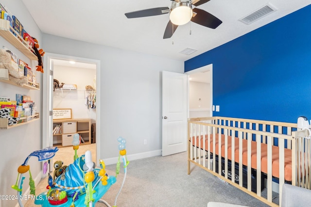 carpeted bedroom featuring ceiling fan