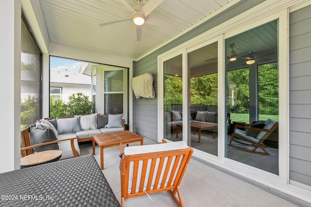 sunroom / solarium with ceiling fan