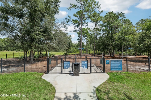 view of home's community featuring a yard