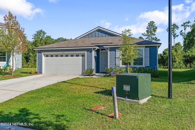 view of front of house featuring board and batten siding, an attached garage, driveway, and a front yard