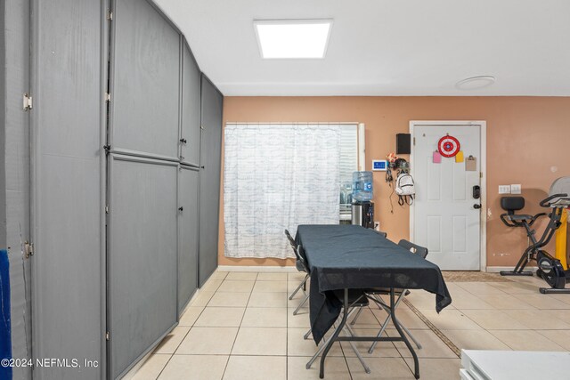 office space with billiards and light tile patterned floors