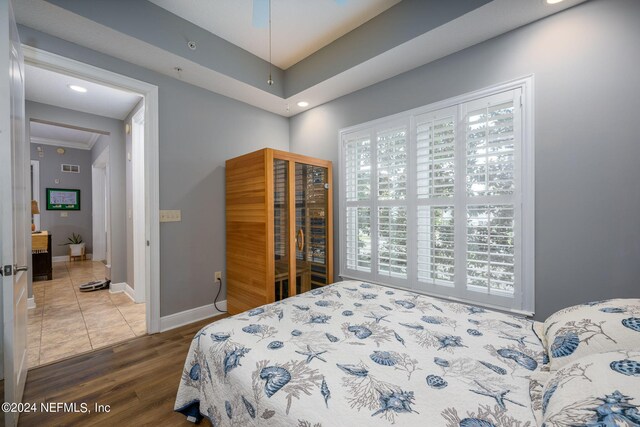 bedroom with wood-type flooring