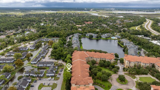 drone / aerial view with a water view