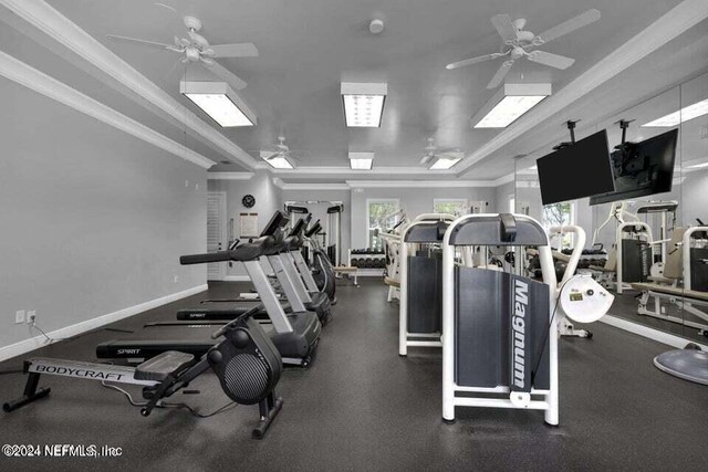 gym with ceiling fan and ornamental molding