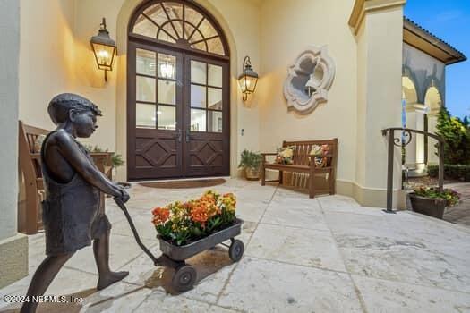 view of exterior entry with french doors