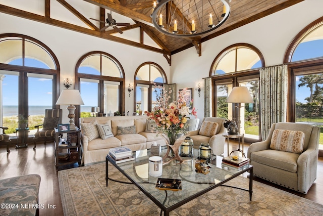 901 Ponte Vedra Blvd, Ponte Vedra Beach, FL 32082 - living room with high vaulted ceiling, french doors, wood finished floors, and ceiling fan with notable chandelier