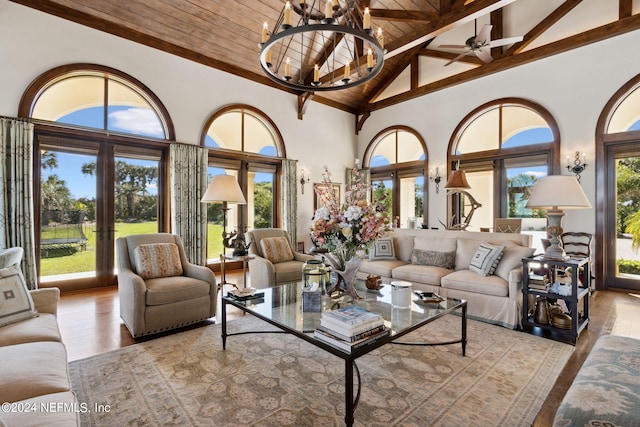 901 Ponte Vedra Blvd, Ponte Vedra Beach, FL 32082 - living area with wood finished floors, wood ceiling, ceiling fan with notable chandelier, beam ceiling, and high vaulted ceiling