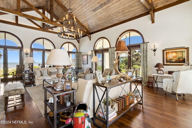 living room with dark wood-type flooring, high vaulted ceiling, wooden ceiling, beam ceiling, and an inviting chandelier