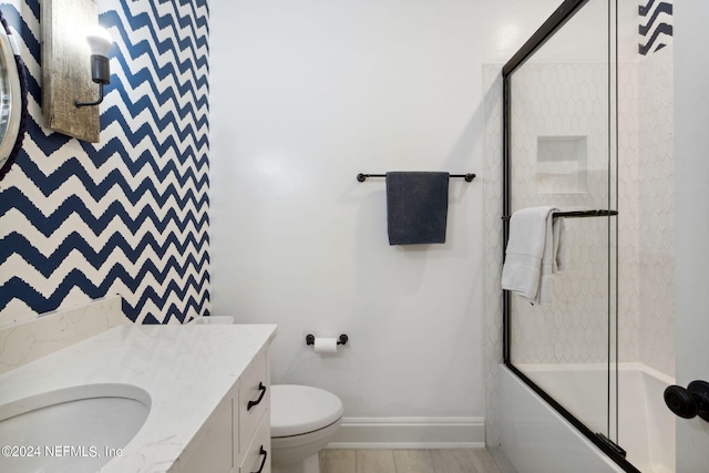 901 Ponte Vedra Blvd, Ponte Vedra Beach, FL 32082 - full bathroom featuring baseboards, toilet, combined bath / shower with glass door, and vanity