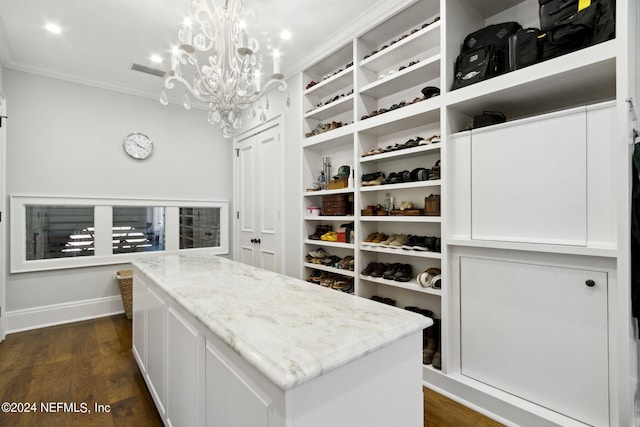 901 Ponte Vedra Blvd, Ponte Vedra Beach, FL 32082 - spacious closet featuring dark wood-style flooring, a chandelier, and visible vents