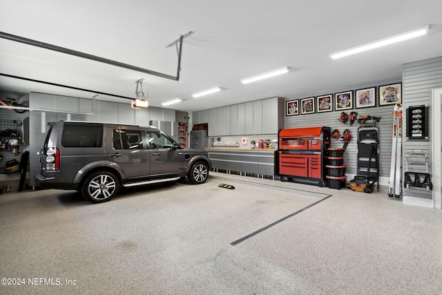 garage featuring a garage door opener