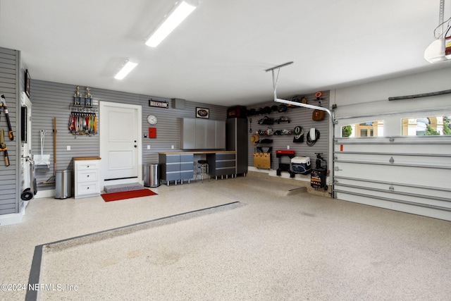 garage with a workshop area