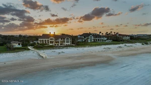 property view of water featuring a beach view