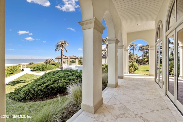 view of patio featuring a water view