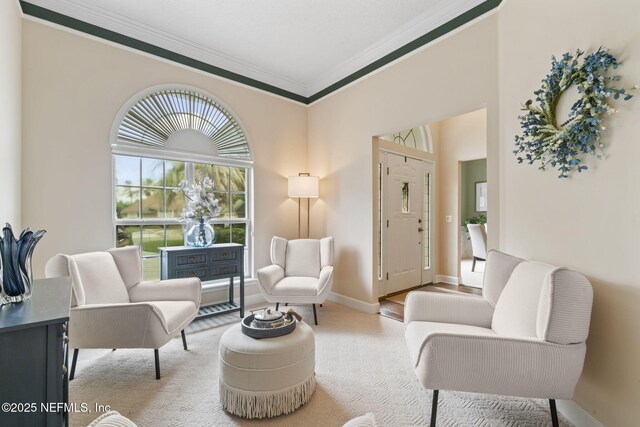 4039 Glenhurst Dr N, Jacksonville, FL 32224 - living room featuring crown molding and baseboards