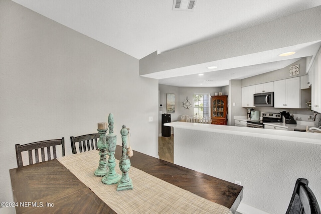 dining room with visible vents