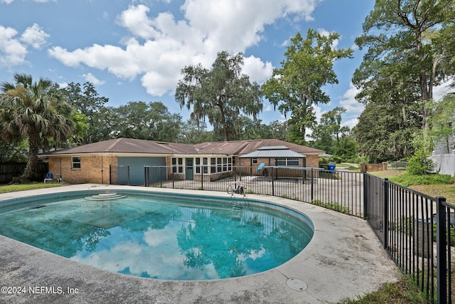 view of pool featuring a patio area