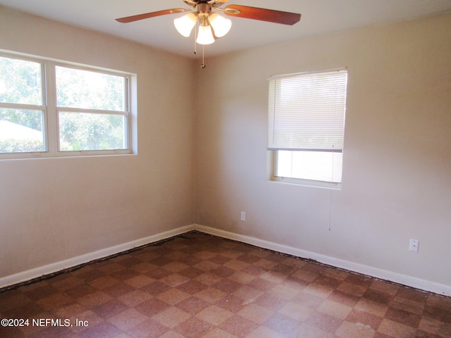 spare room featuring ceiling fan