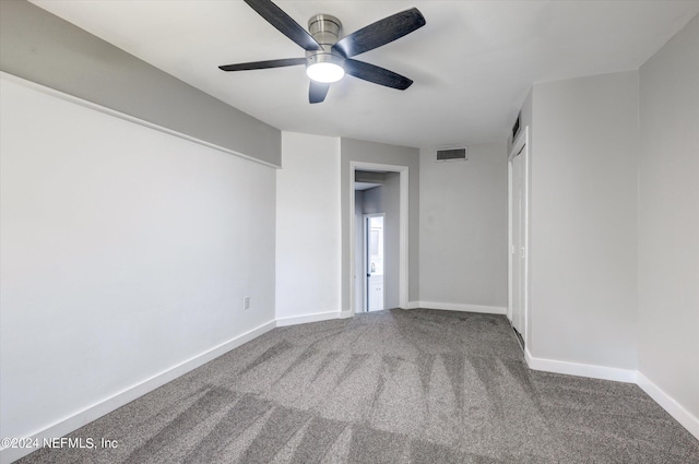 unfurnished bedroom with carpet and ceiling fan