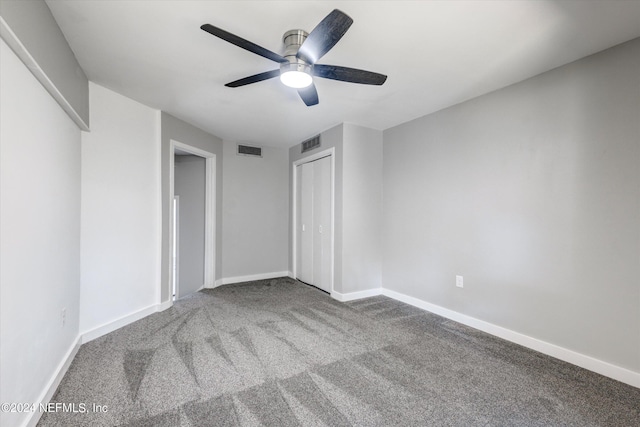 unfurnished bedroom with carpet flooring and ceiling fan