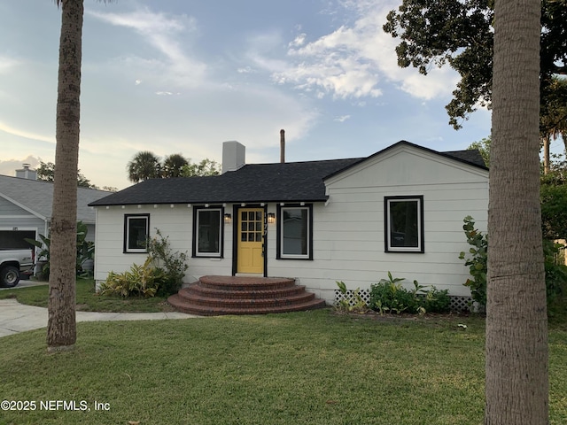 ranch-style house with a front yard