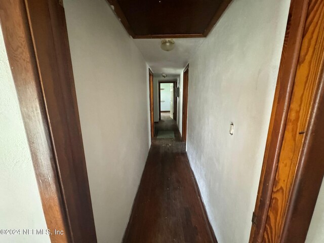 hall featuring wood-type flooring