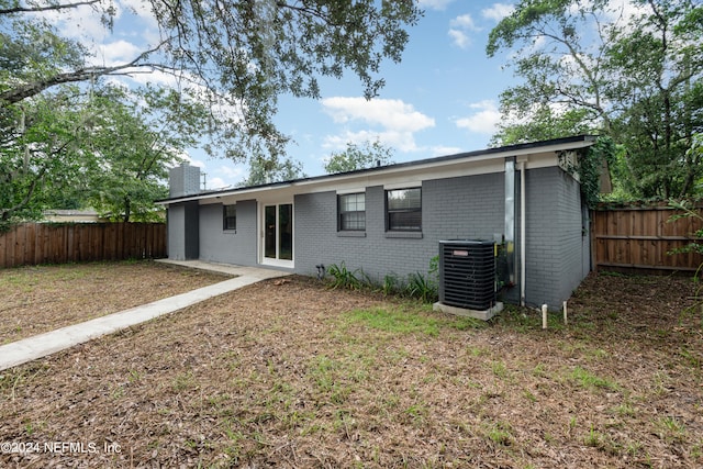 back of property with cooling unit