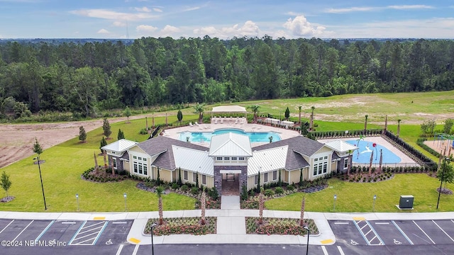 exterior space featuring a forest view