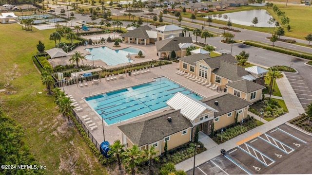 aerial view featuring a residential view and a water view