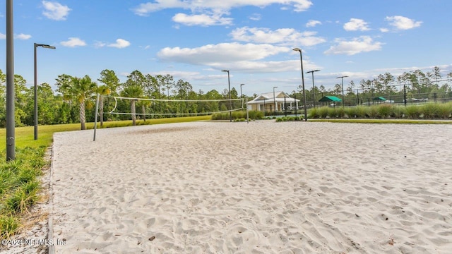 view of property's community featuring volleyball court