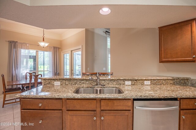 kitchen with sink, crown molding, light tile patterned floors, dishwasher, and hanging light fixtures