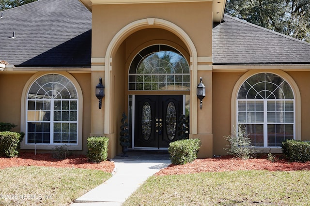 doorway to property featuring french doors